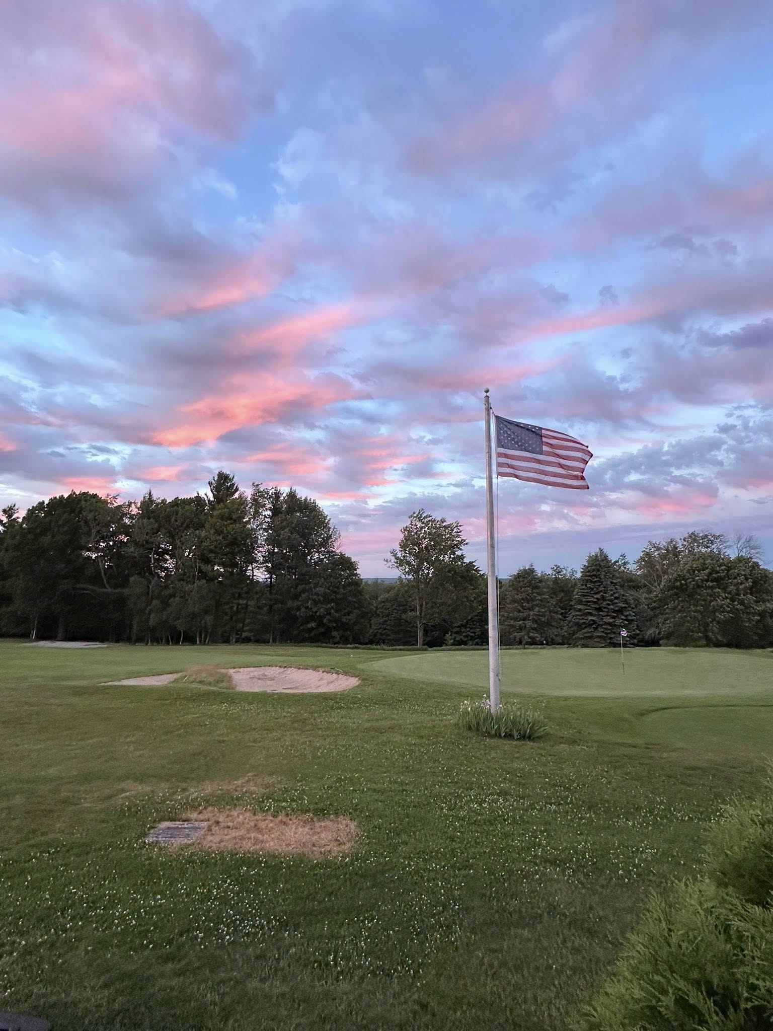 The flag against an evening sky